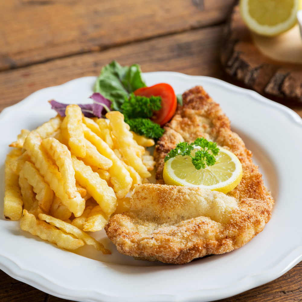 schnitzel.pommes.salat .zitrone.ketchup.schlemmerbox24.de